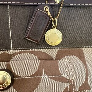 Coach Brown Signature Canvas Tote with Gold-Tone Coin Charm